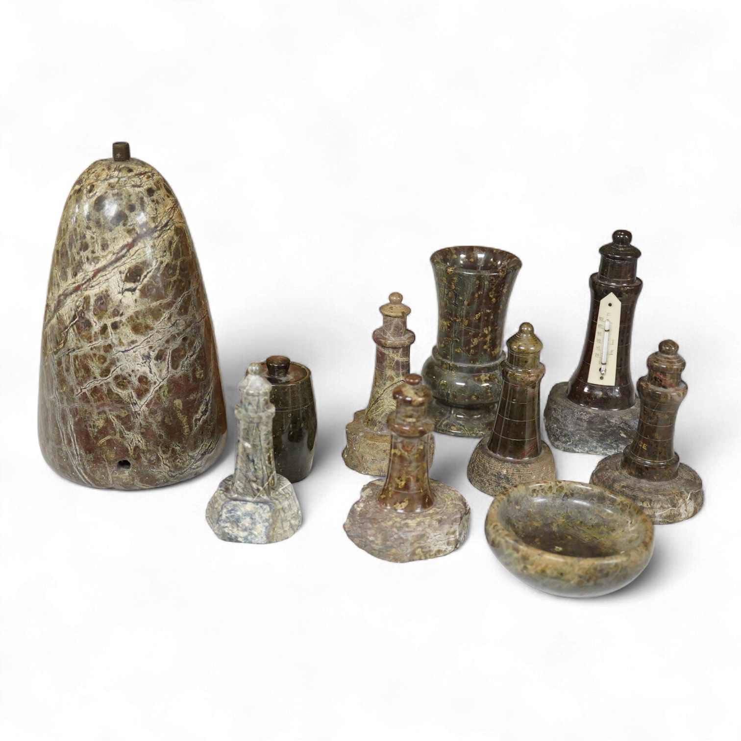 A collection of cornish serpentine to include a desk thermometer, map base and pin dish, largest 19cm high